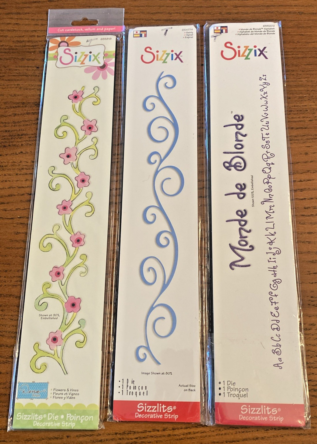 3 Sizzix Sizzlits Decorative Strip Monde de Blonde Alphabet, Swirly, Flowers & V