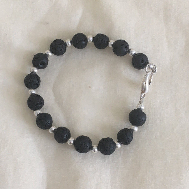 8mm Round Lava Stone Bracelet 4 mm Silverplated Spacers 7 inches long