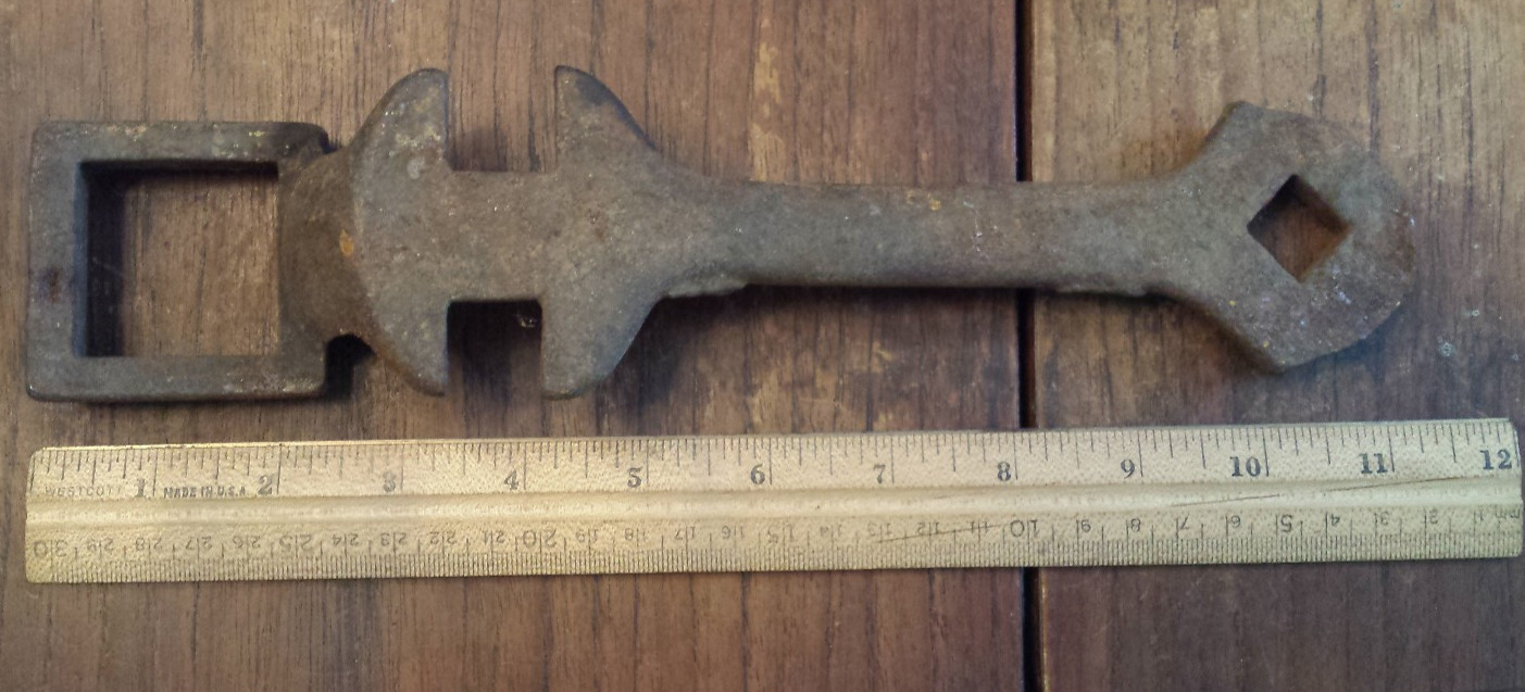 vintage cast iron unbranded Multi-Wrench - some damage