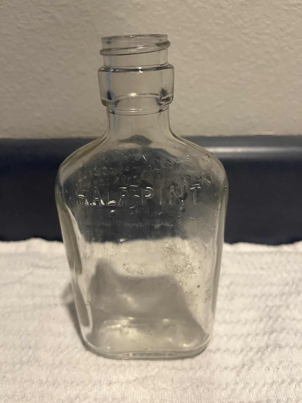 Clear Glass Embossed Half Pint Liquor Bottle Collectible Modern