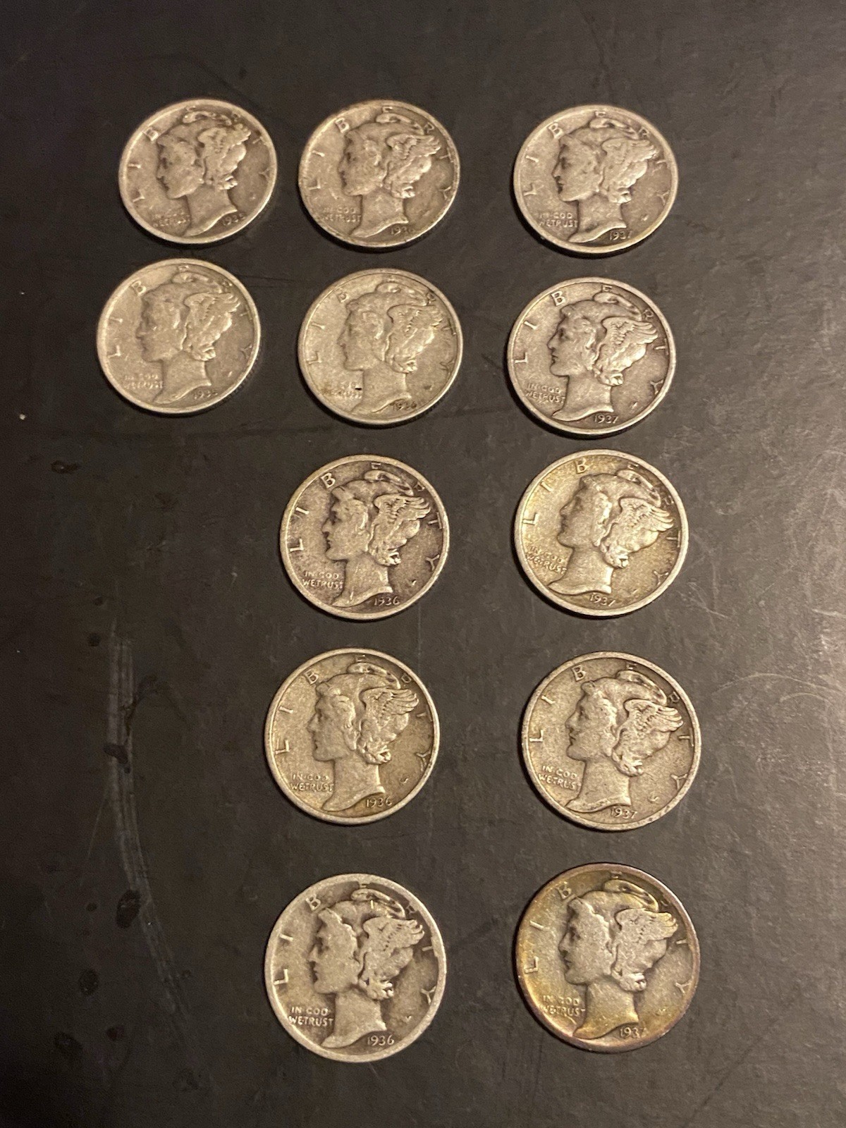 1935-1937 Mercury Dime Lot Of TWELVE Mercury silver Dimes