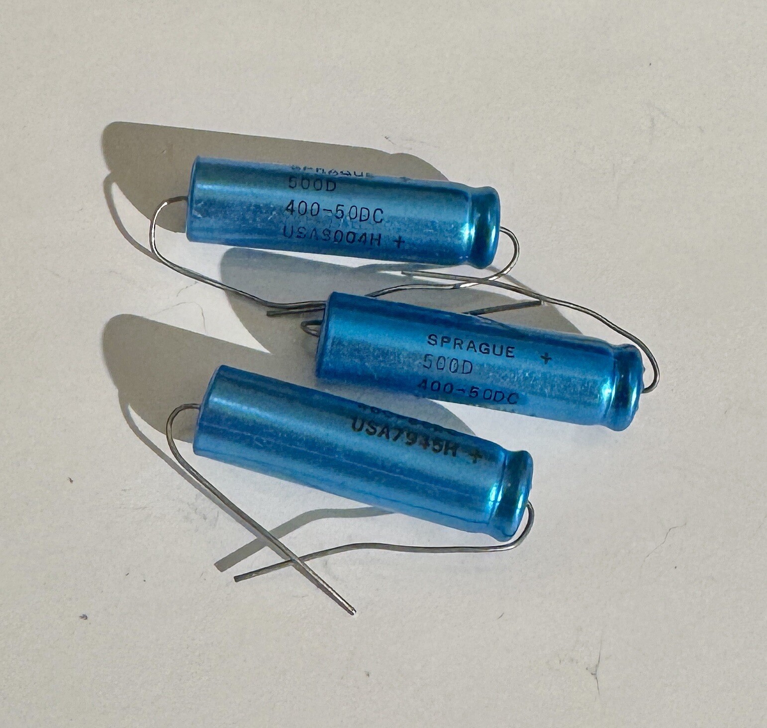3 pack Sprague 400 UF 50 VDC axial capacitors 13x45mm
