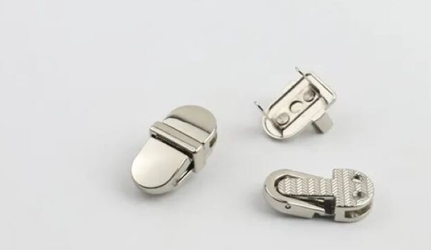 Silver turn lock purse thumb lock. lock hardware for handbags