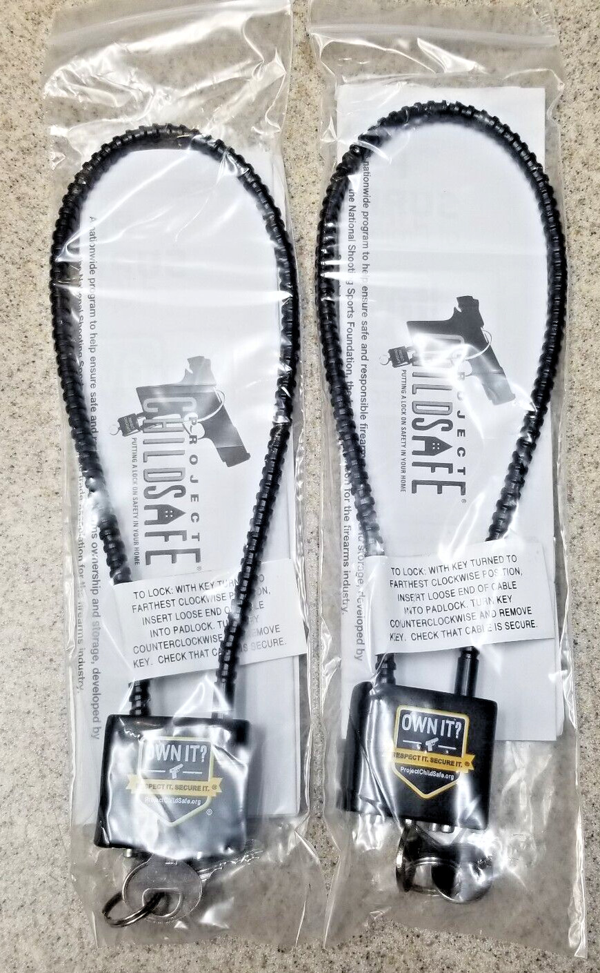 2 Pack Of Project Childsafe Cable Style Gun Lock with 2 Keys - New In Package