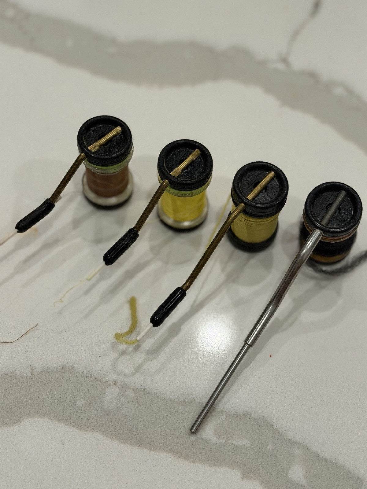 Rite Bobbins, which are specialized adjustable-tension bobbins