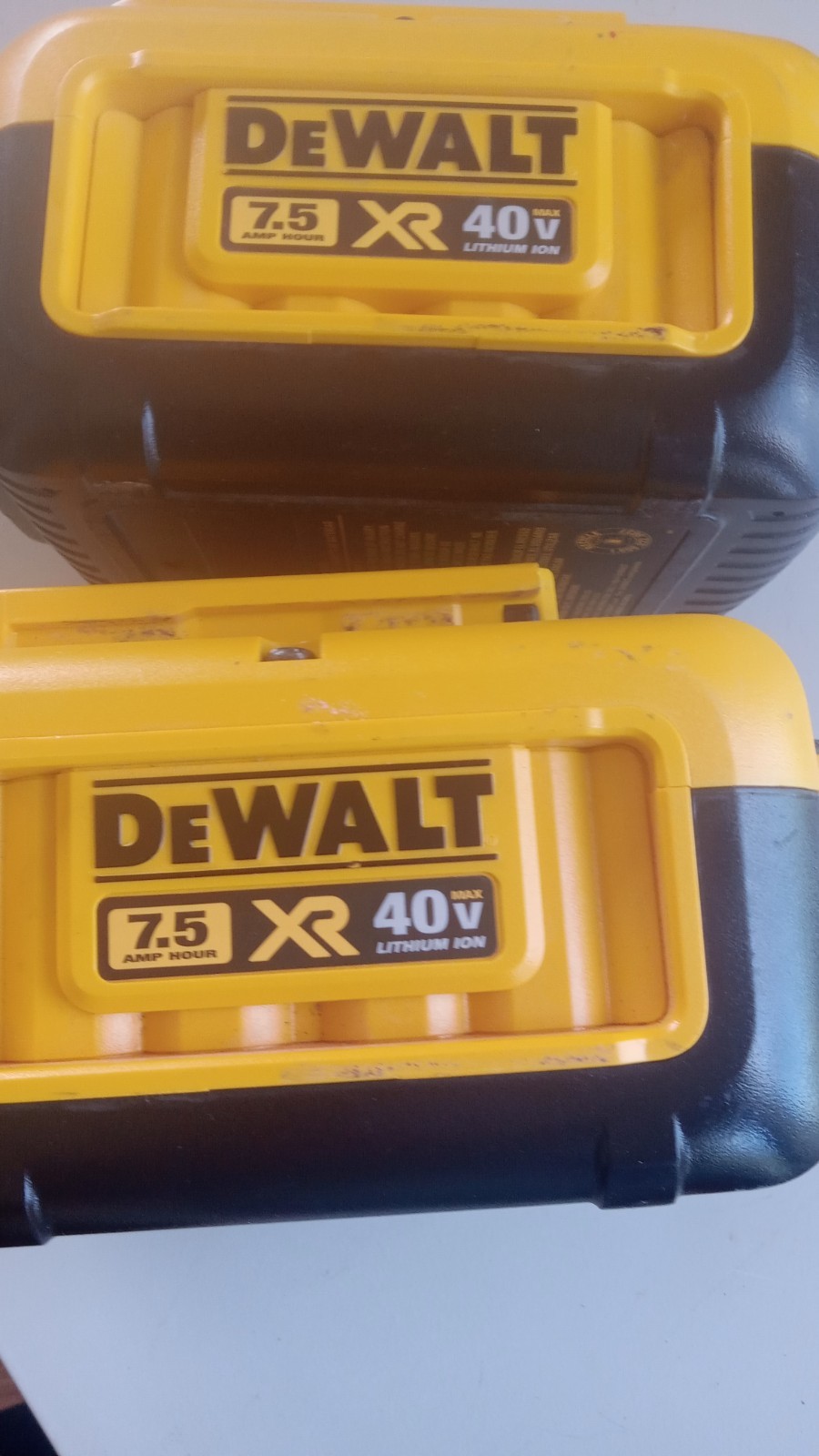 2 used dewalt 40 volt 7.5 battery for repairs