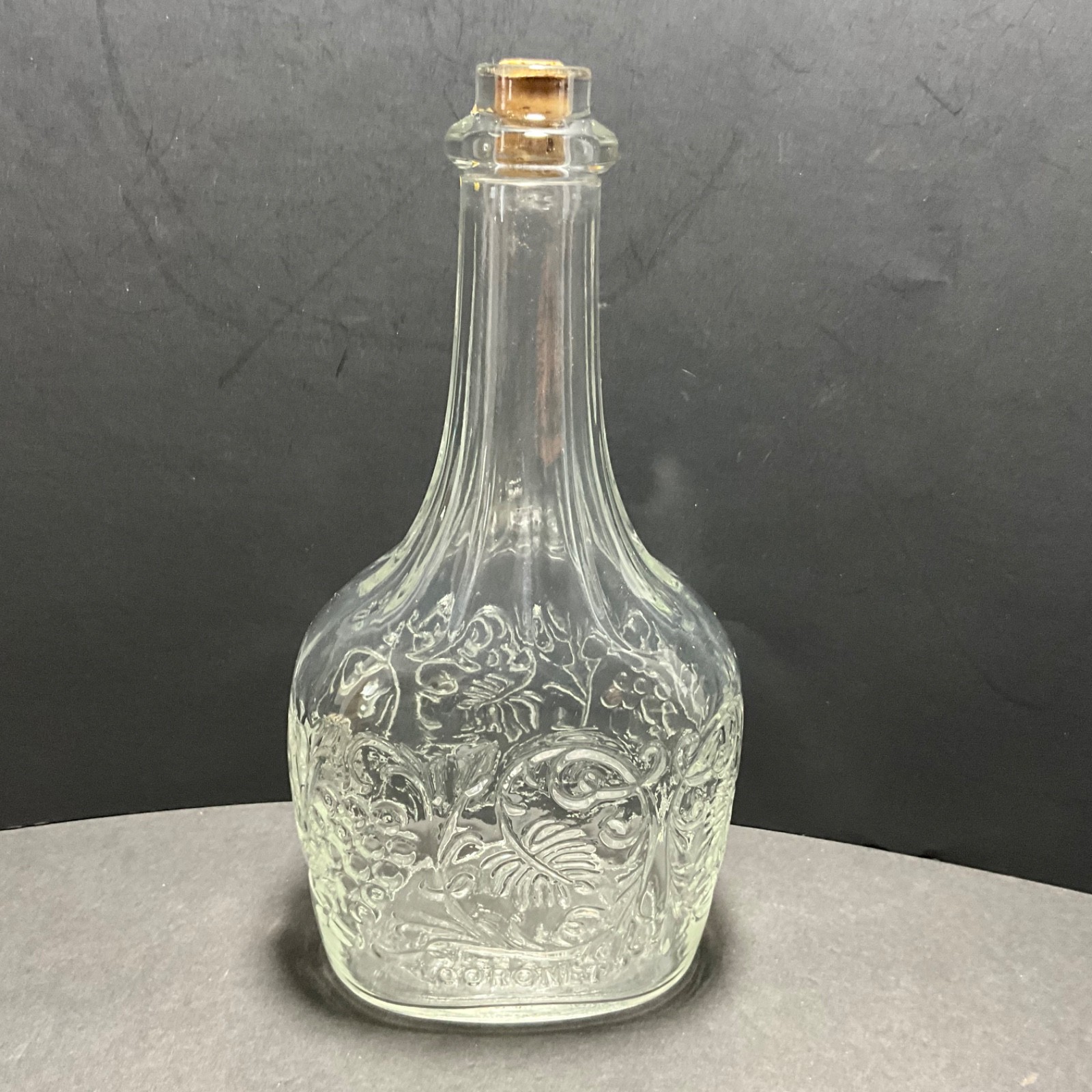 VINTAGE CORONET EMBOSSED BOTTLE GRAPE VINE MOTIF W/CORK 9”H RARE