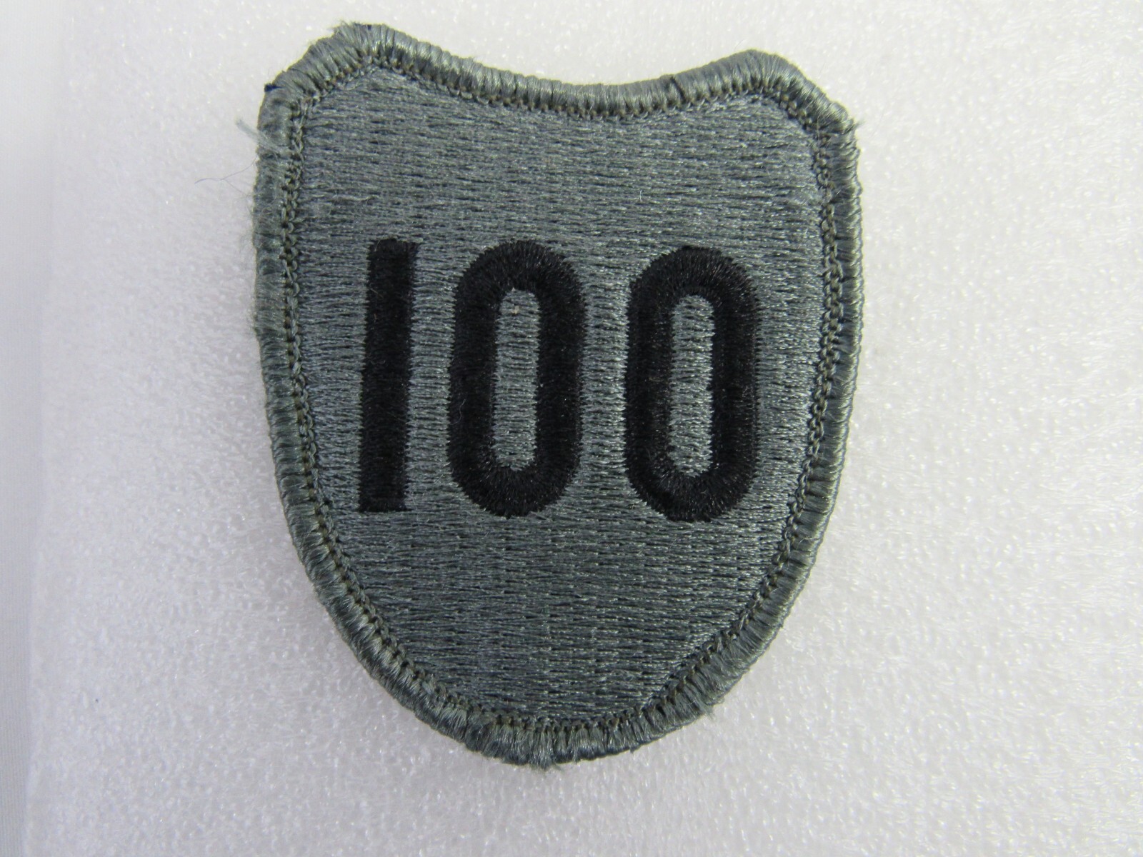 U.S. Army 100th Infantry Division Subdued Shoulder Hook Patch Insignia BDU