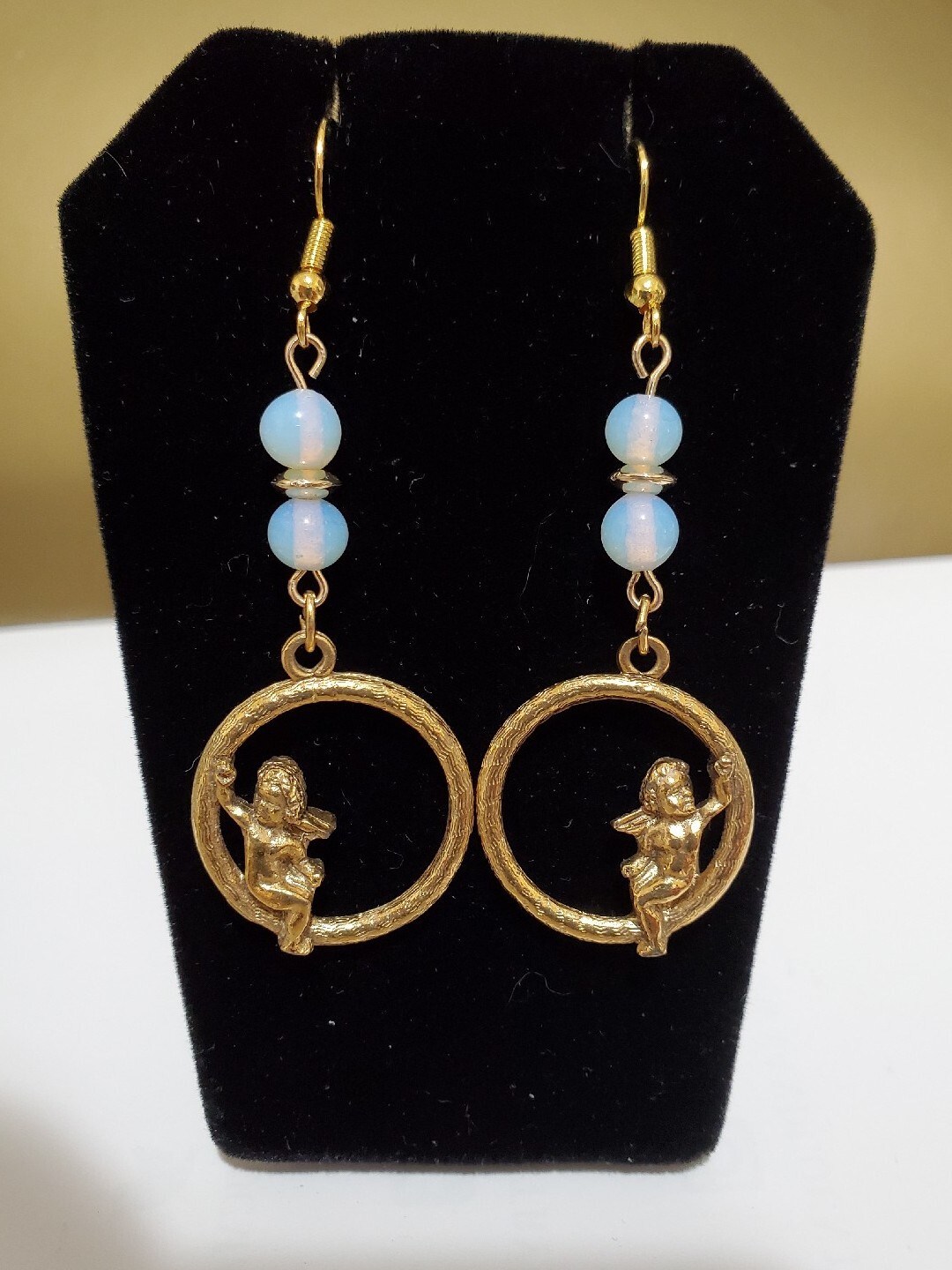 VINTAGE 2 1/2" SWINGING ANGELS DANGLE PIERCED EARRINGS,  GOLDTONE W/OPAL GLASS