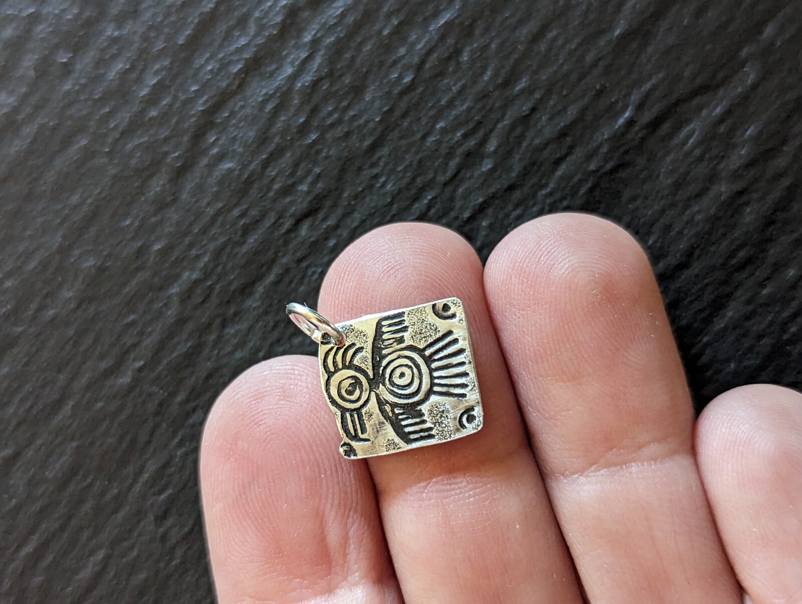 Tiny sterling silver charm with a bird sumbol - handmade - freeform