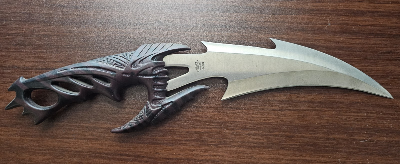 Fantasy Dragon Claw Dagger with Intricate Handle Design