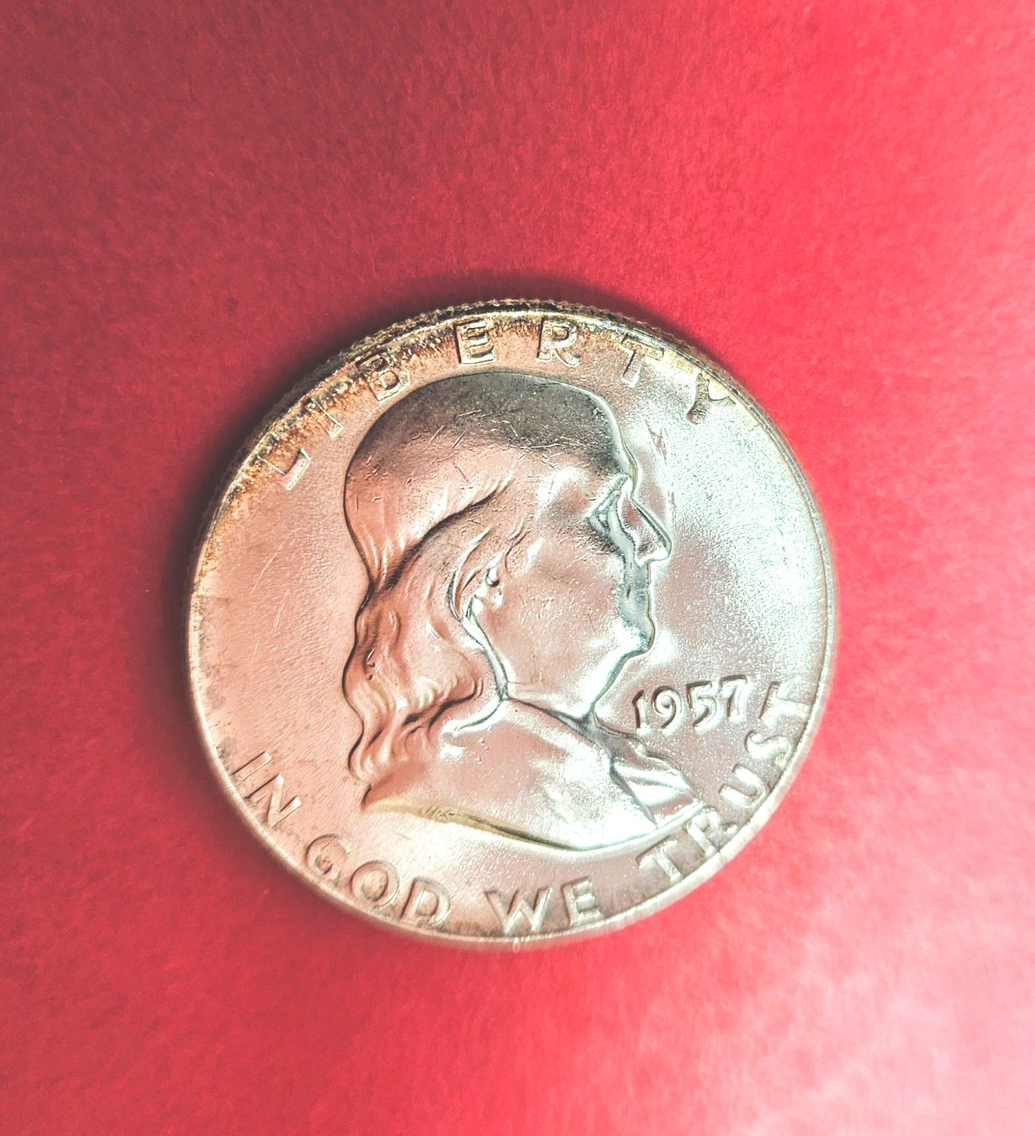 1957 Franklin Silver Half Dollar. About Uncirculated. Nice Bell Lines.