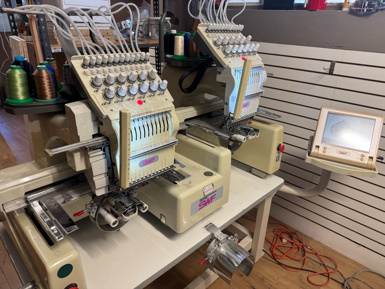SWF 12-needle dual head independent embroidery machine Primary tabs