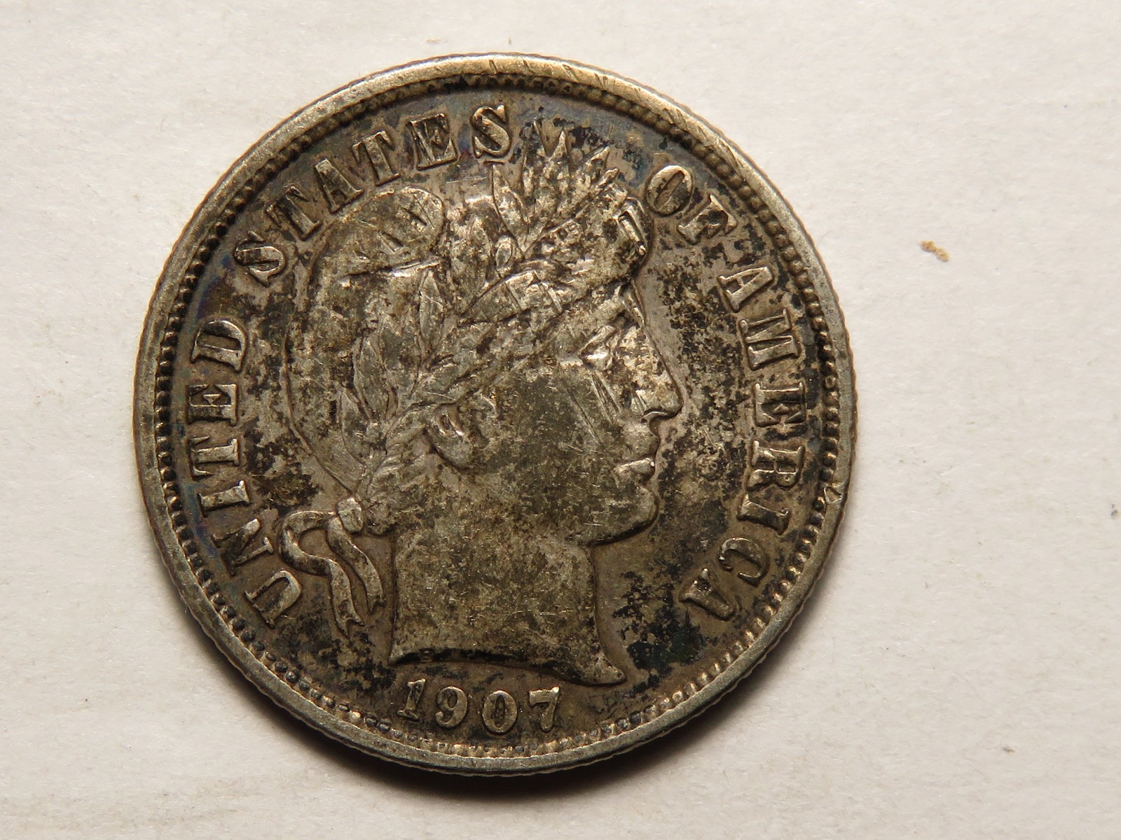 1907-S Barber Dime with XF Details; Bent and Scratched