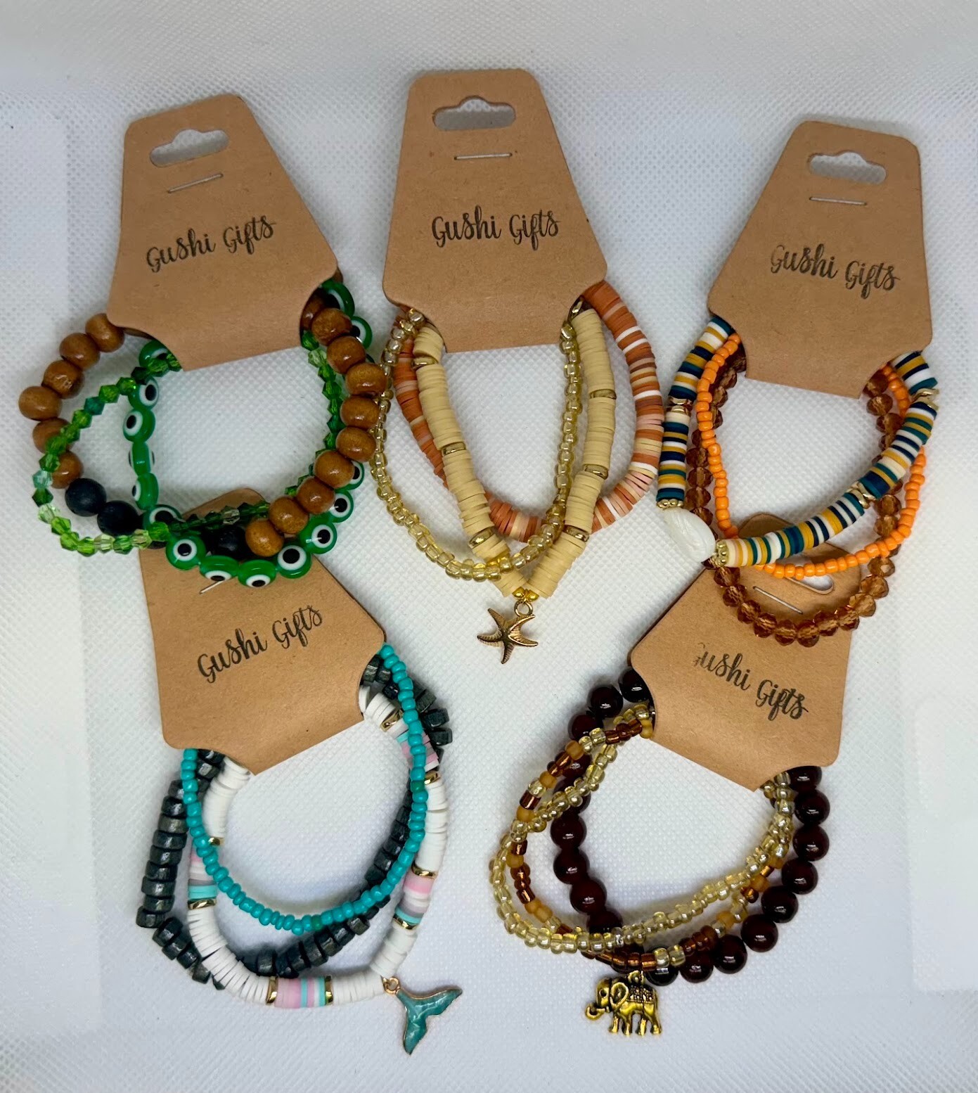 5 Sets of Handmade Beaded Bracelets with Charms
