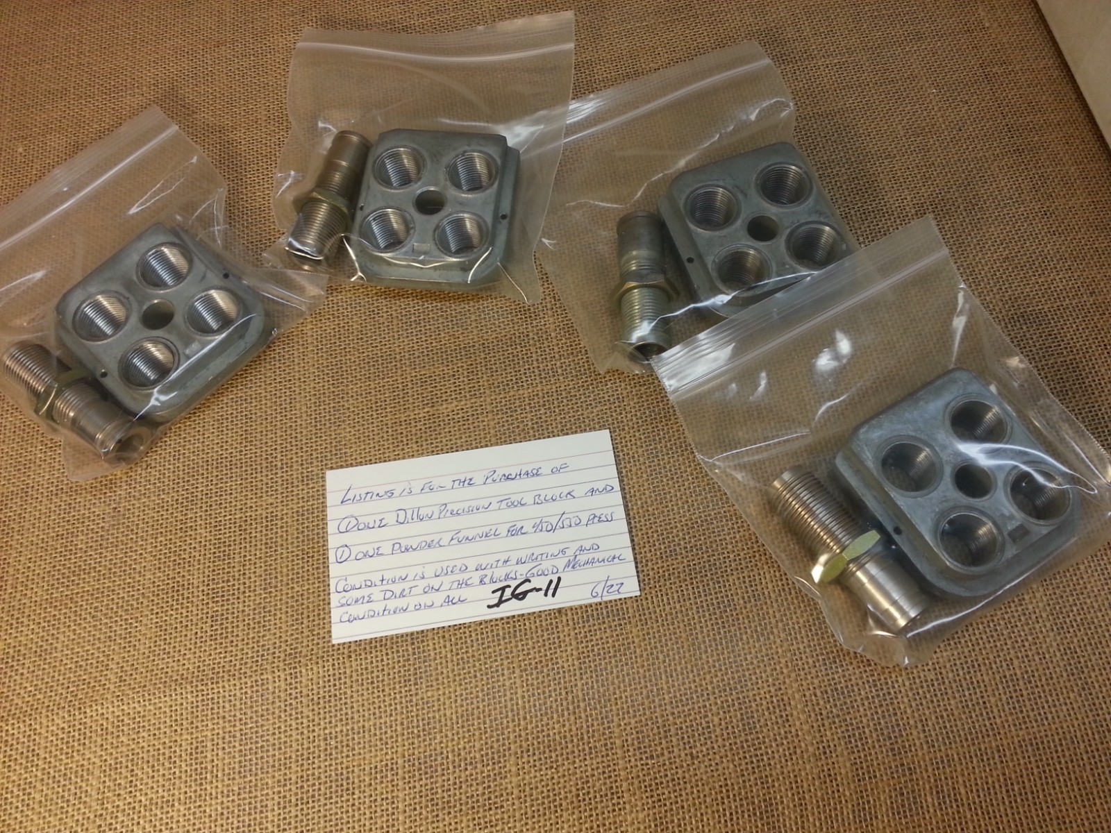 (1) One Dillon Precision Tool Block and (1) Powder funnel for 450/550 Press