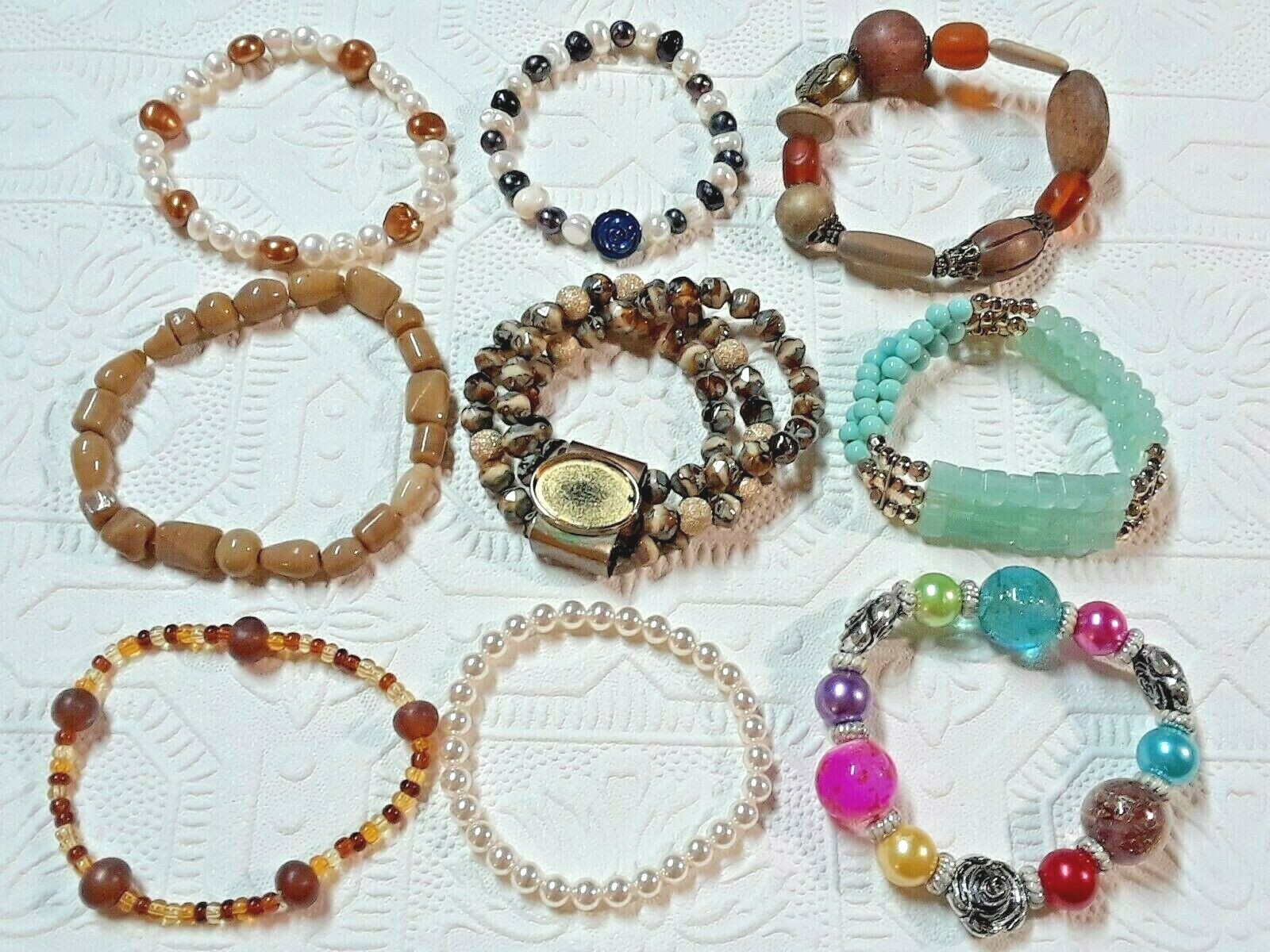 Beaded bracelets. Freshwater pearls, beige stones, wood, glass beads +