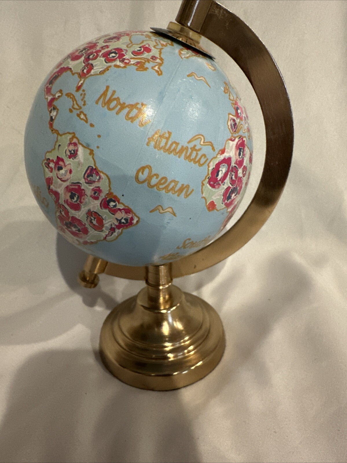 World Globe With Flowers By Threshold?
