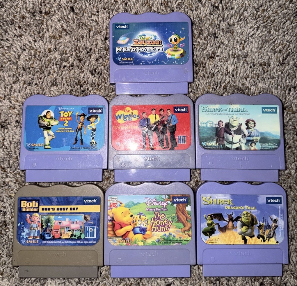 7 Vintage V Tech V Smile Games Lot Toy Story, The Wiggles, Pooh & More