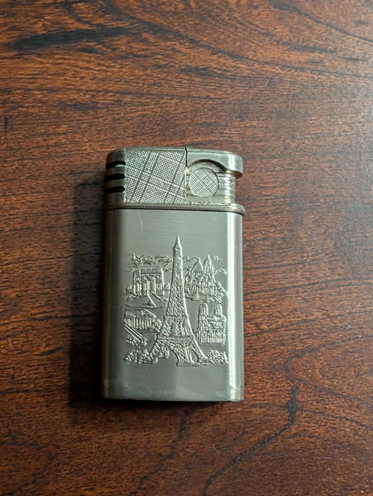 Paris themelighter from the 1970s with Eiffel Tower relief, France, Paris.