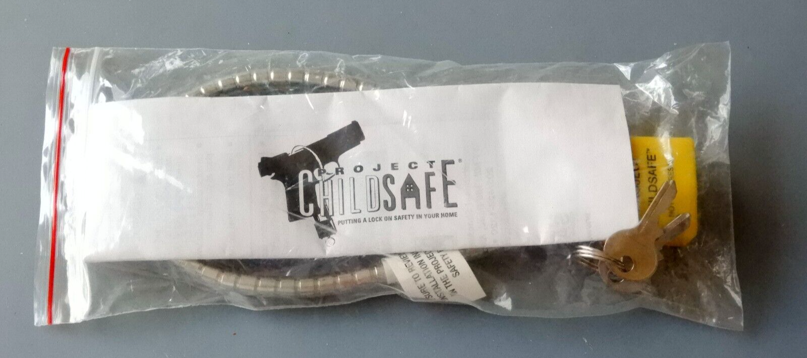 New-In-Package Project ChildSafe Cable Lock for Firearms, 2 Keys, Instructions