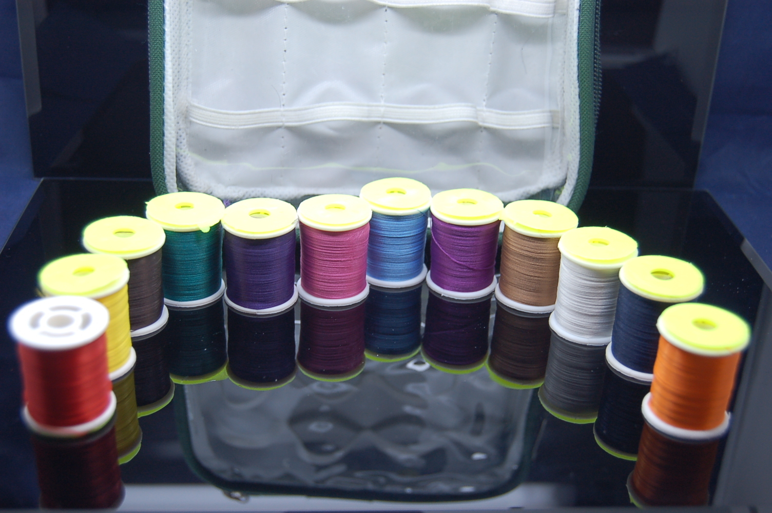 12x large spools of thread in a plastic protective bag