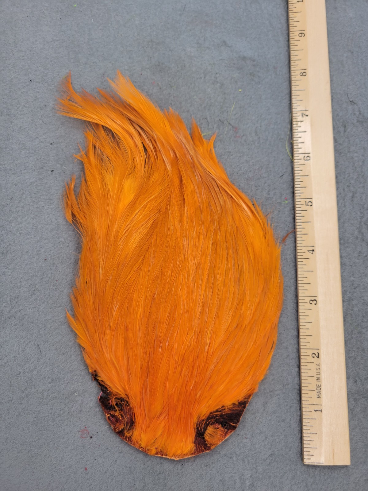 Lot 242,  Grade B,  DYED ORANGE India Rooster Streamer Neck Cape Feathers