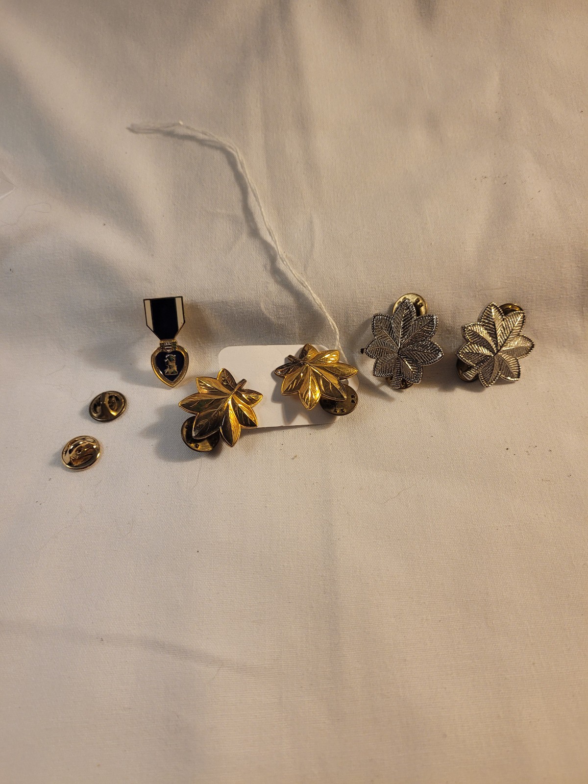 Assorted lot of military pin, gf oak leaves silver tone oak leaves & purple hear