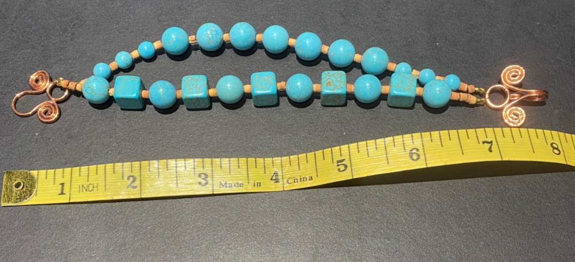 Turquoise and wood  Beaded bracelet Handmade  USA with a fancy clasp.