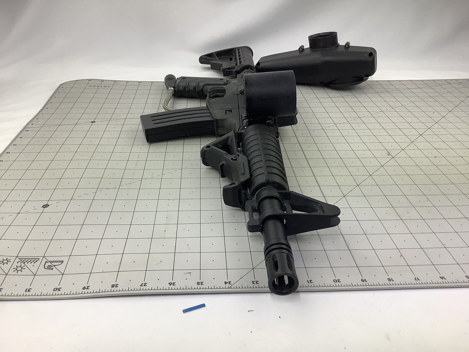 Tippmann Alpha black paintball marker with e trigger and cyclone feed untested