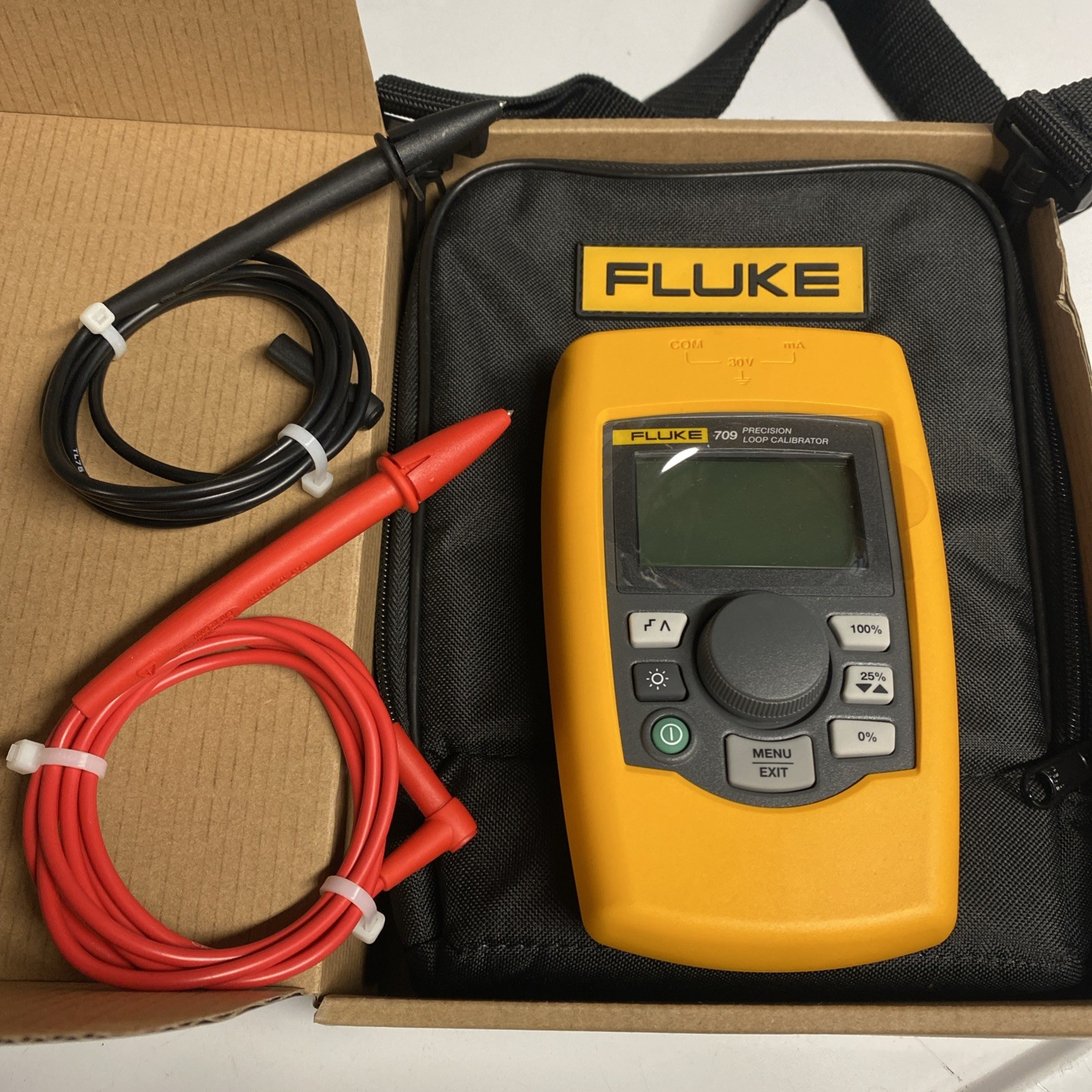 Fluke 709 Precision Loop Calibrator.  Factory New Condition With Case And Leads.