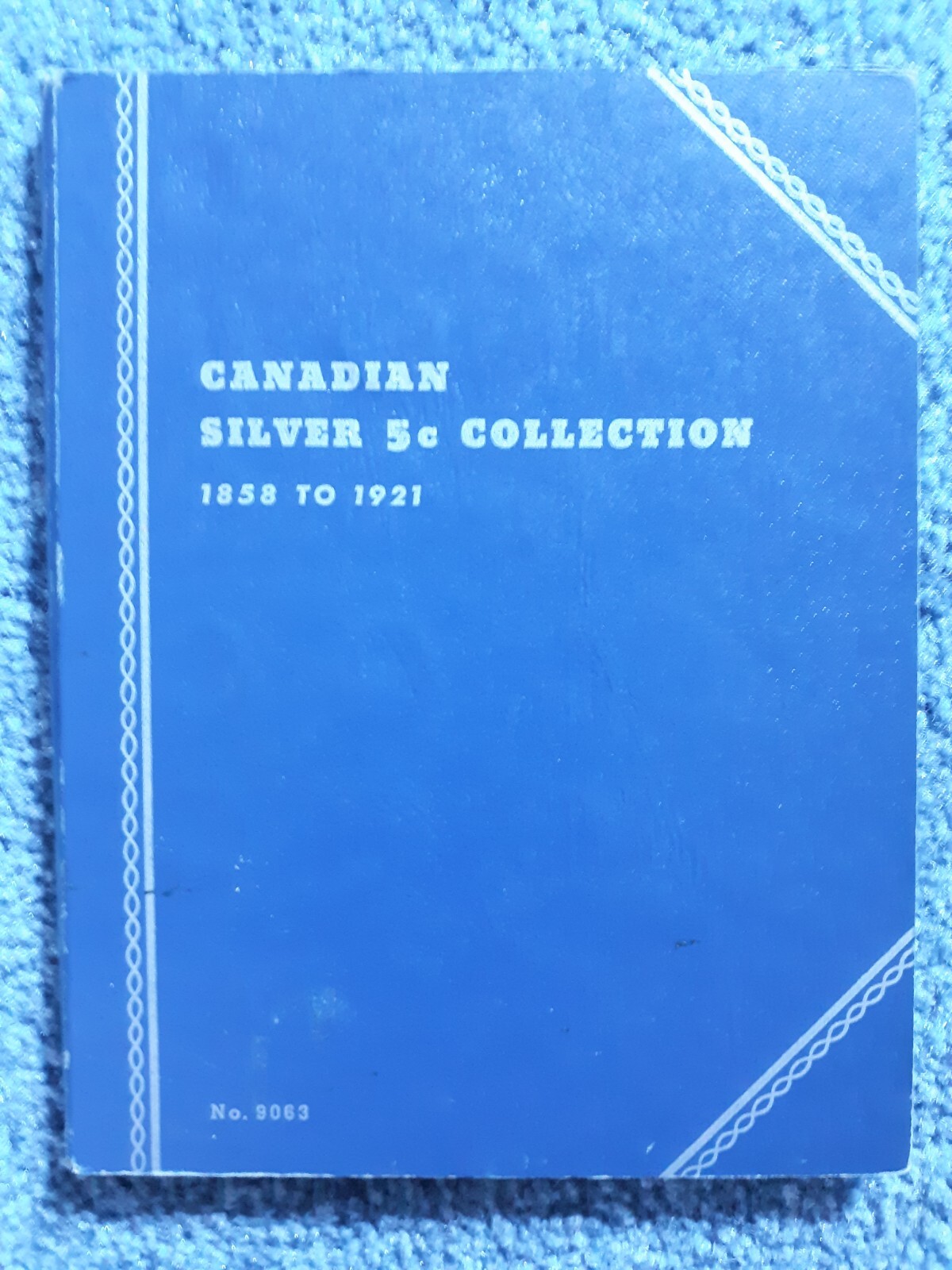 23 DIFFERENT CANADA 5c SILVERS IN FOLDER