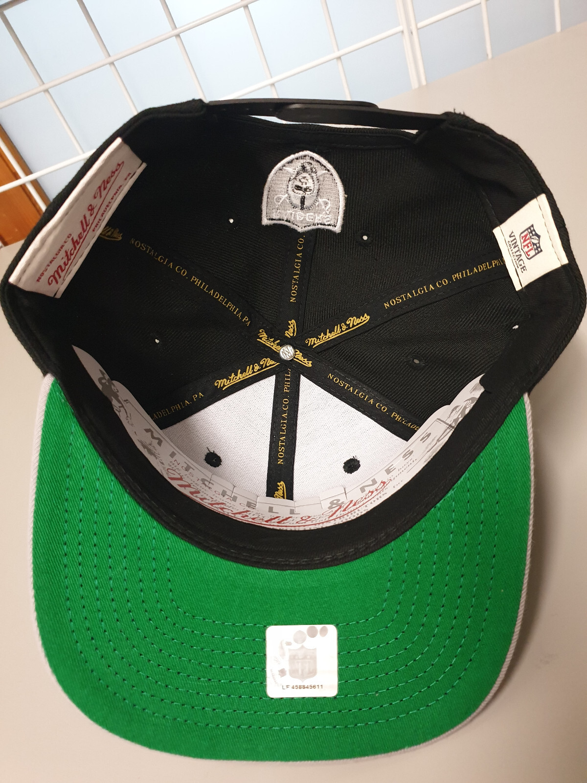 Mitchell & Ness NFL Los Angele Raiders Black Gray Script Vintage Snapback Cap