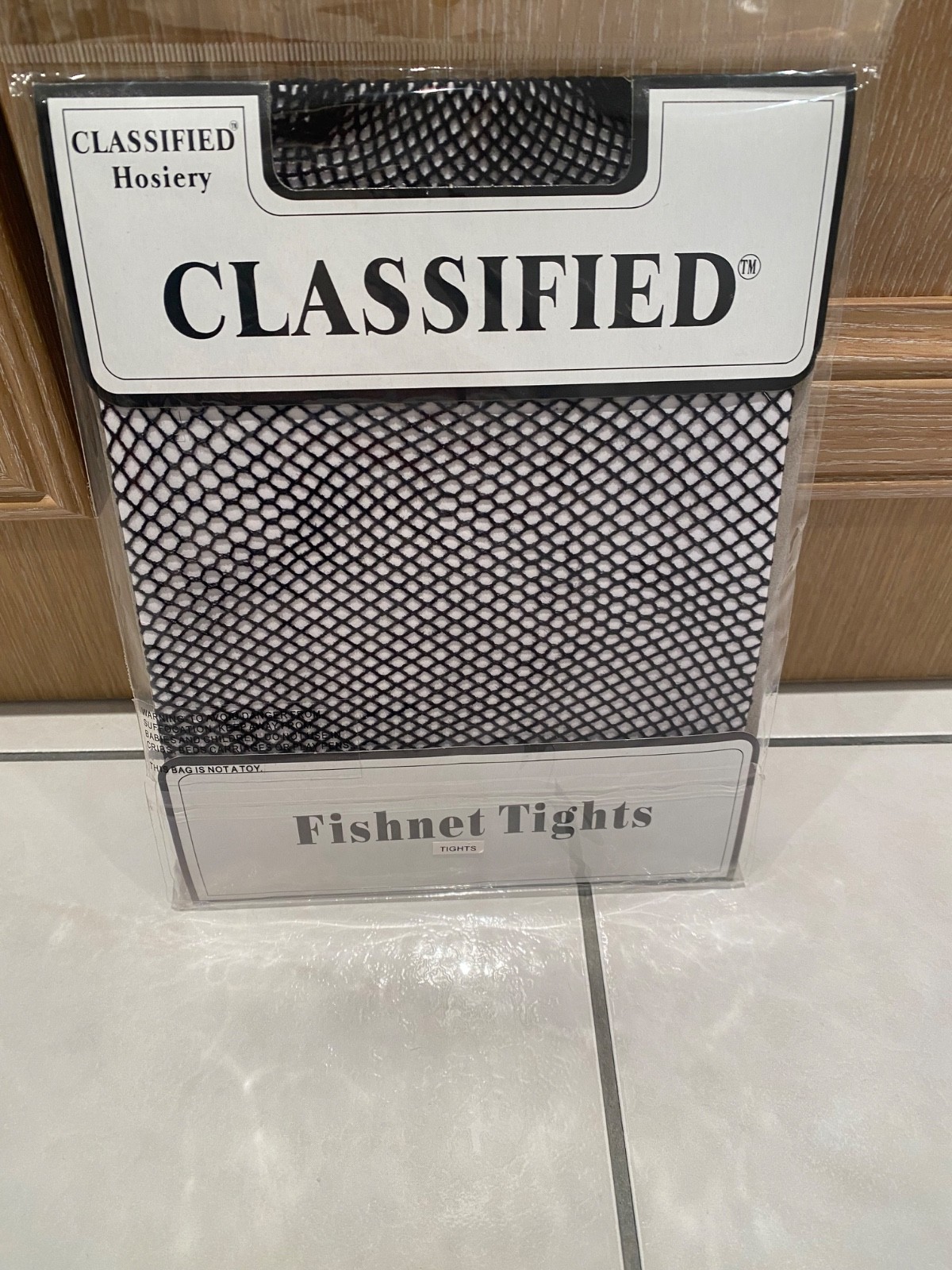 Black Fishnet Tights by  Classified