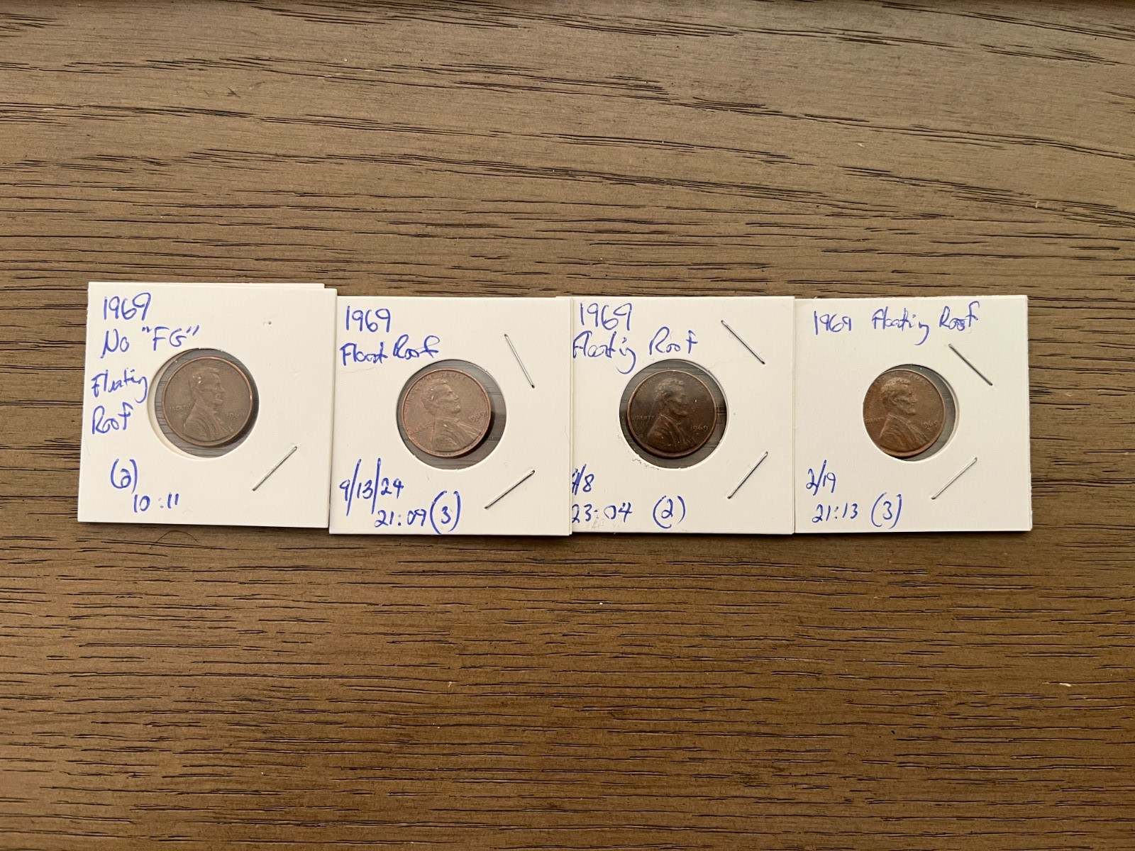 LOT OF FOUR 1969 "FLOATING ROOF" PENNIES