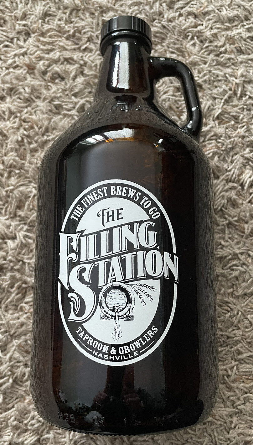 The Fiiling Station Taproom and Growlers glass bottle with lid. Nashville. 64 oz