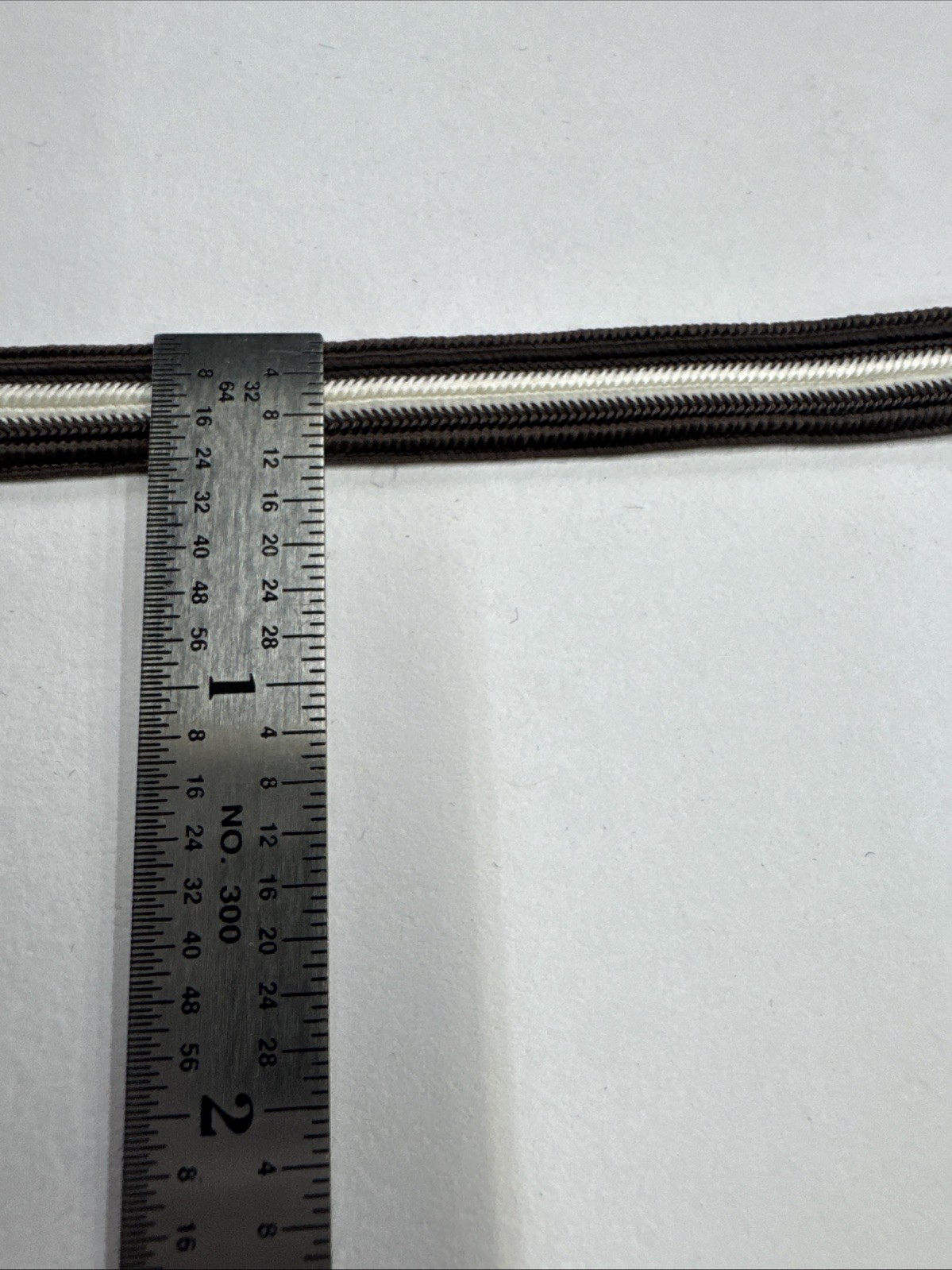 AH Rice Braid - 3/8” Brown With White Center Stripe Braid. 70 Yards. Made In USA