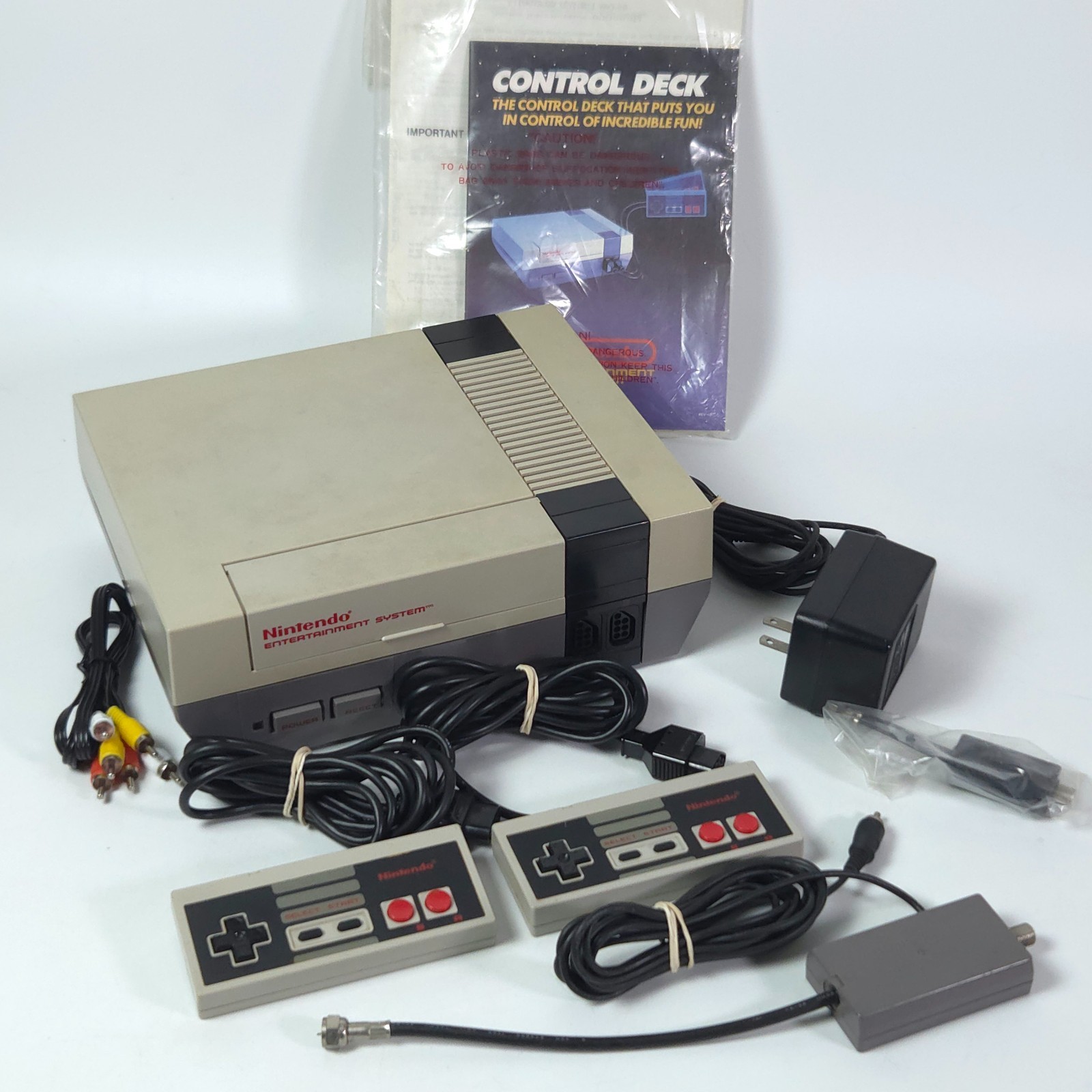 Nintendo NES Console w/ 2 Controllers, Manual, & OEM Adapters - Tested Working
