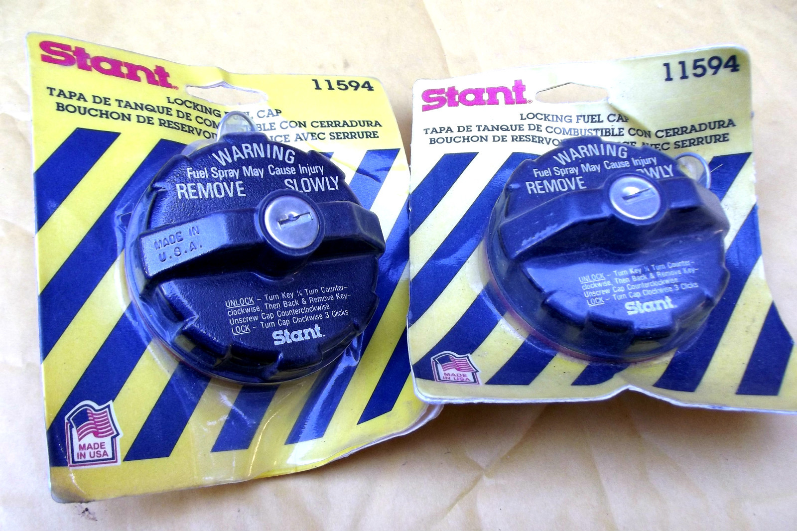 1 NEW STANT 11594, LOCKING GAS/FUEL CAP,CARDED,MADE IN USA.