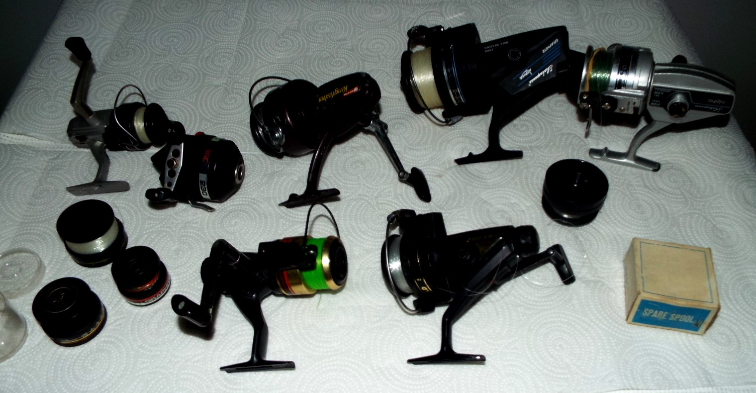 7 VINTAGE FISHING REELS WITH SOME EXTRA SPOOLS GARCIA, QUANTAM ETC.... READ!!!