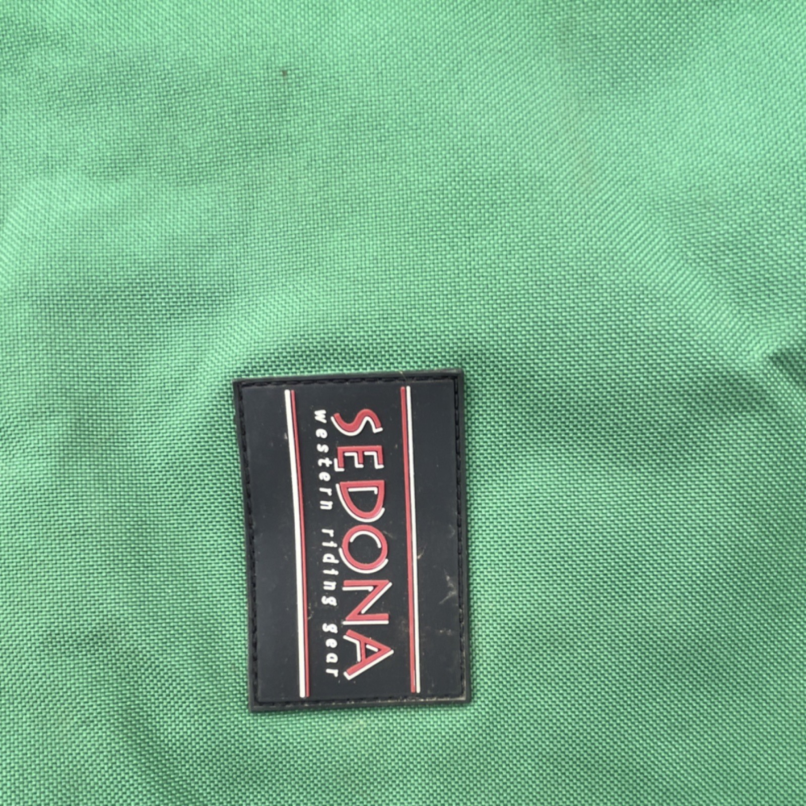 3 saddle covers. One new 2 used