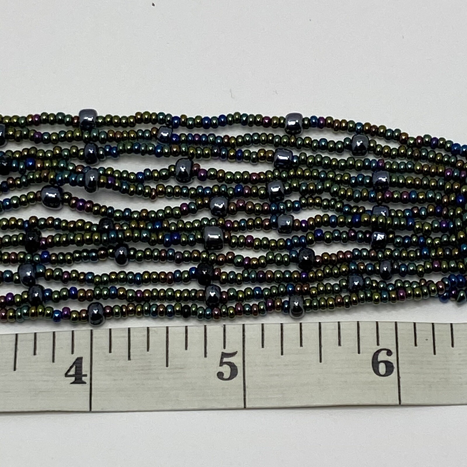 Dark Multi Colored Metallic Seed Bead Multi Strand Bracelet