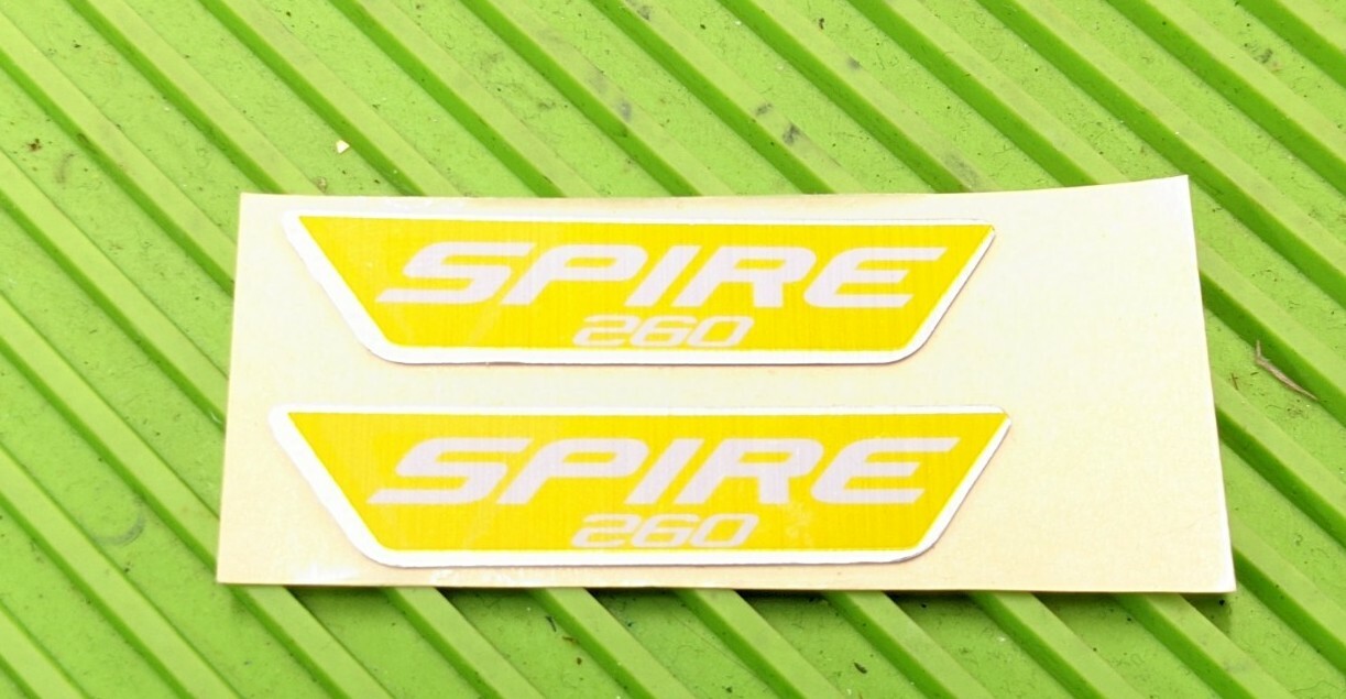 Virtue  SPIRE 260 shell logo sticker/jewel set. Yellow. Brand new. OEM. RARE!