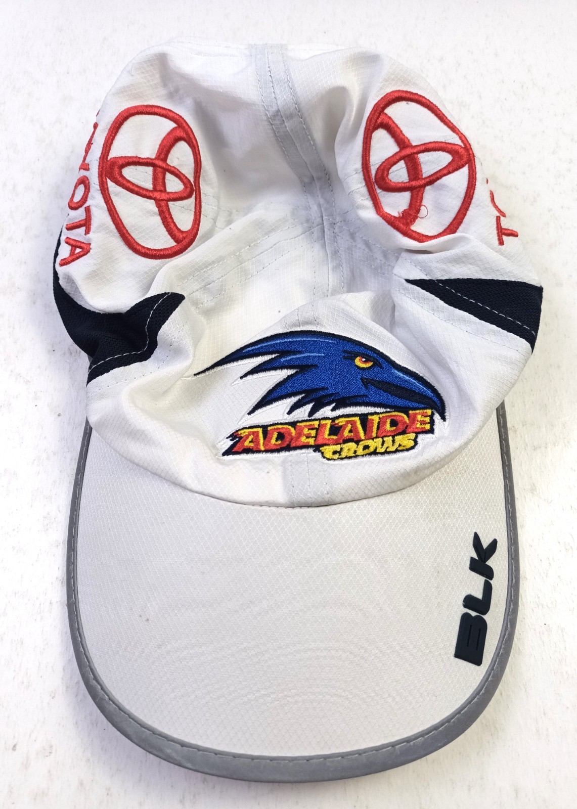 Adelaide Crows AFL On-Field Team Gear Cap BLK. White Strapback. Good
