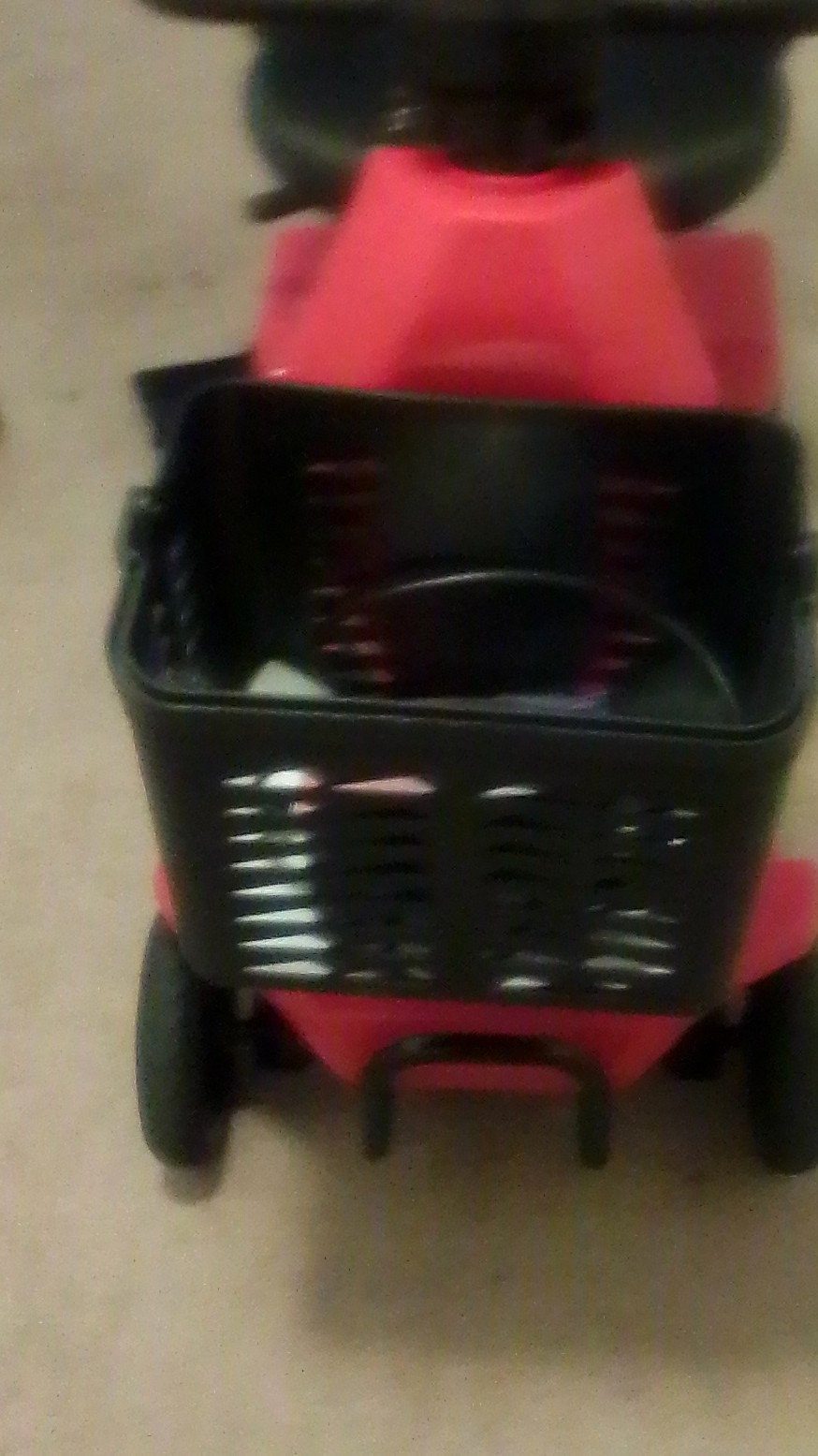 Red 4-Wheeled Mobility Scooter with Basket and Padded Armrest