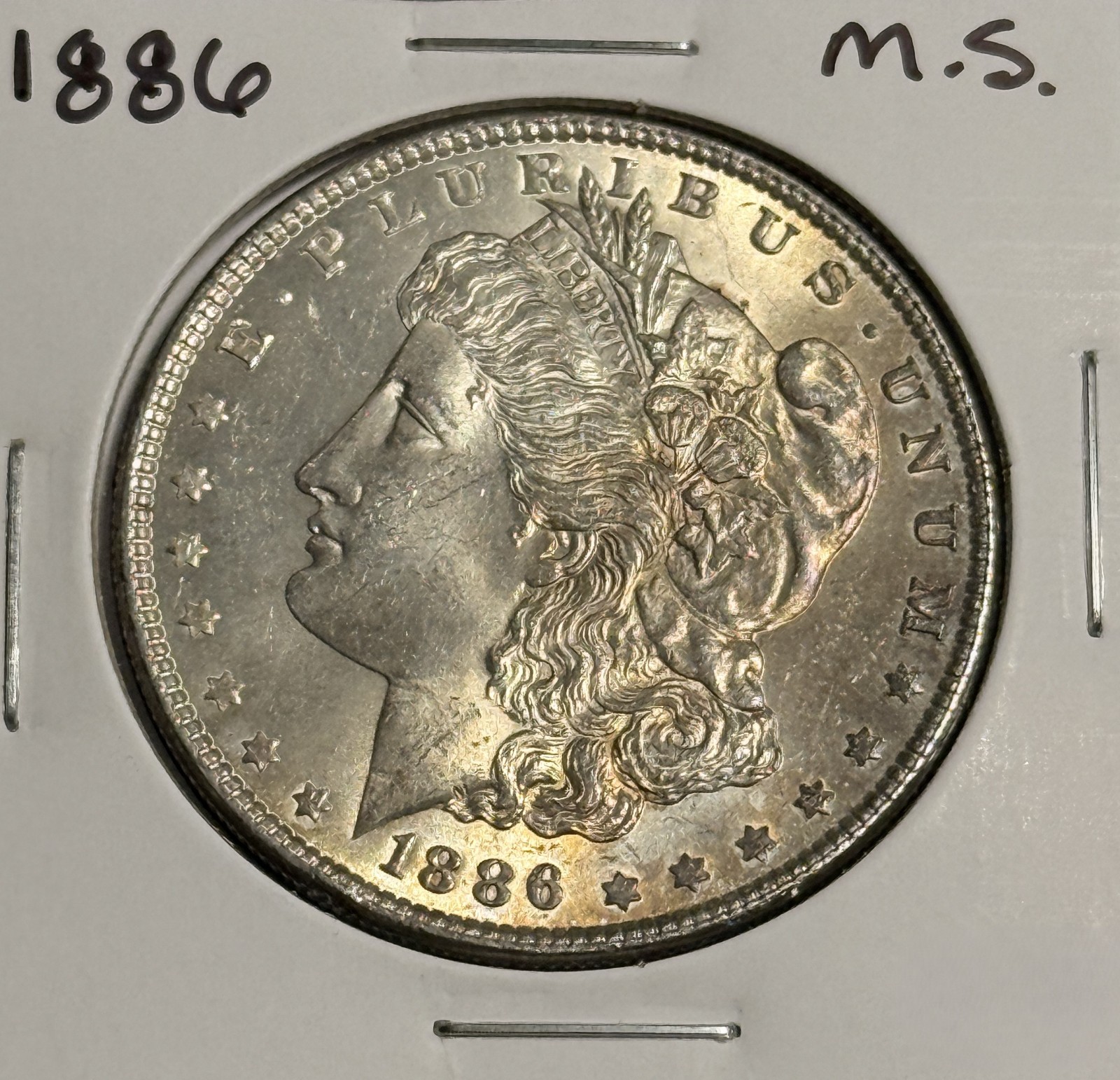 1886 Morgan Silver Dollar, Unc Details. (18942)