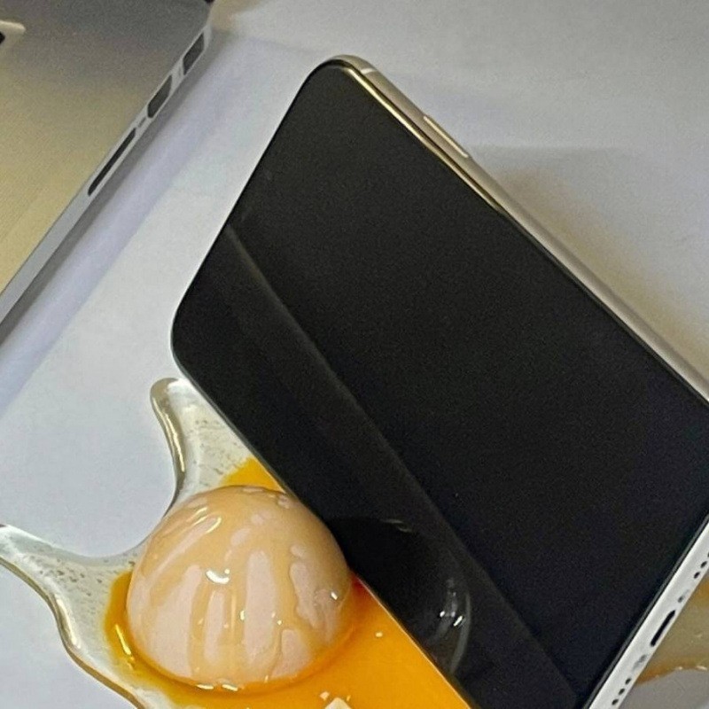 Broken egg mobile phone holder funny prank toy gift