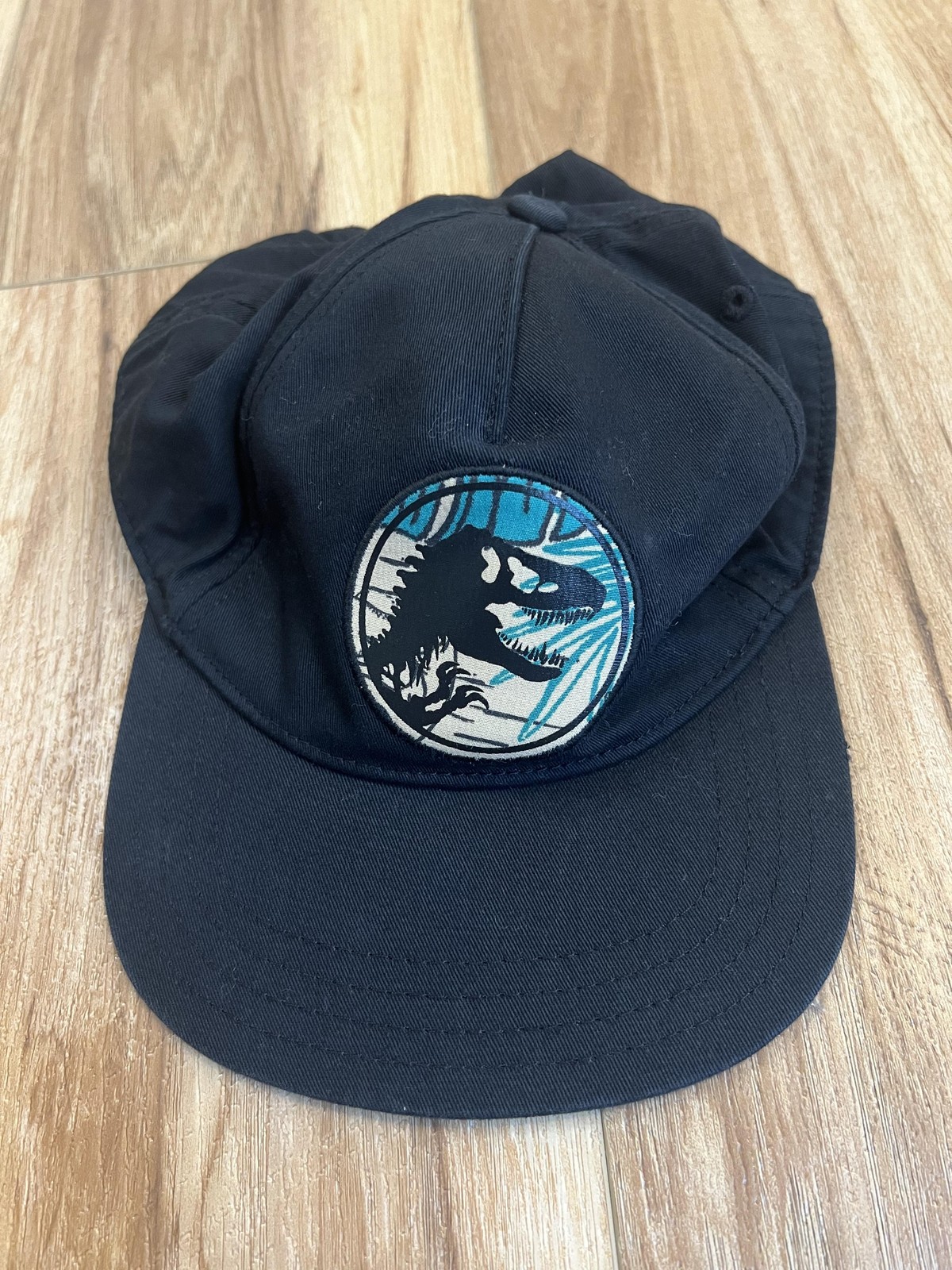 Jurassic World Hat Cap Snap Back Youth M/L Black Floral Underbrim Patch T-Rex