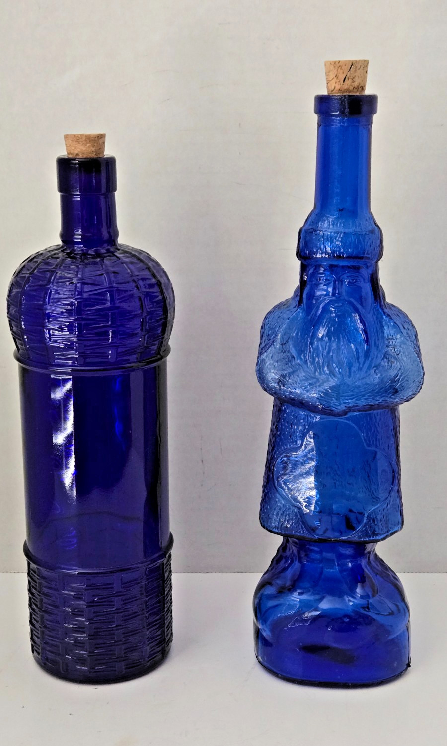 2 Vtg Cobalt Blue Embossed Bottles Figural Santa Claus Belsnickle/ Basket Weave