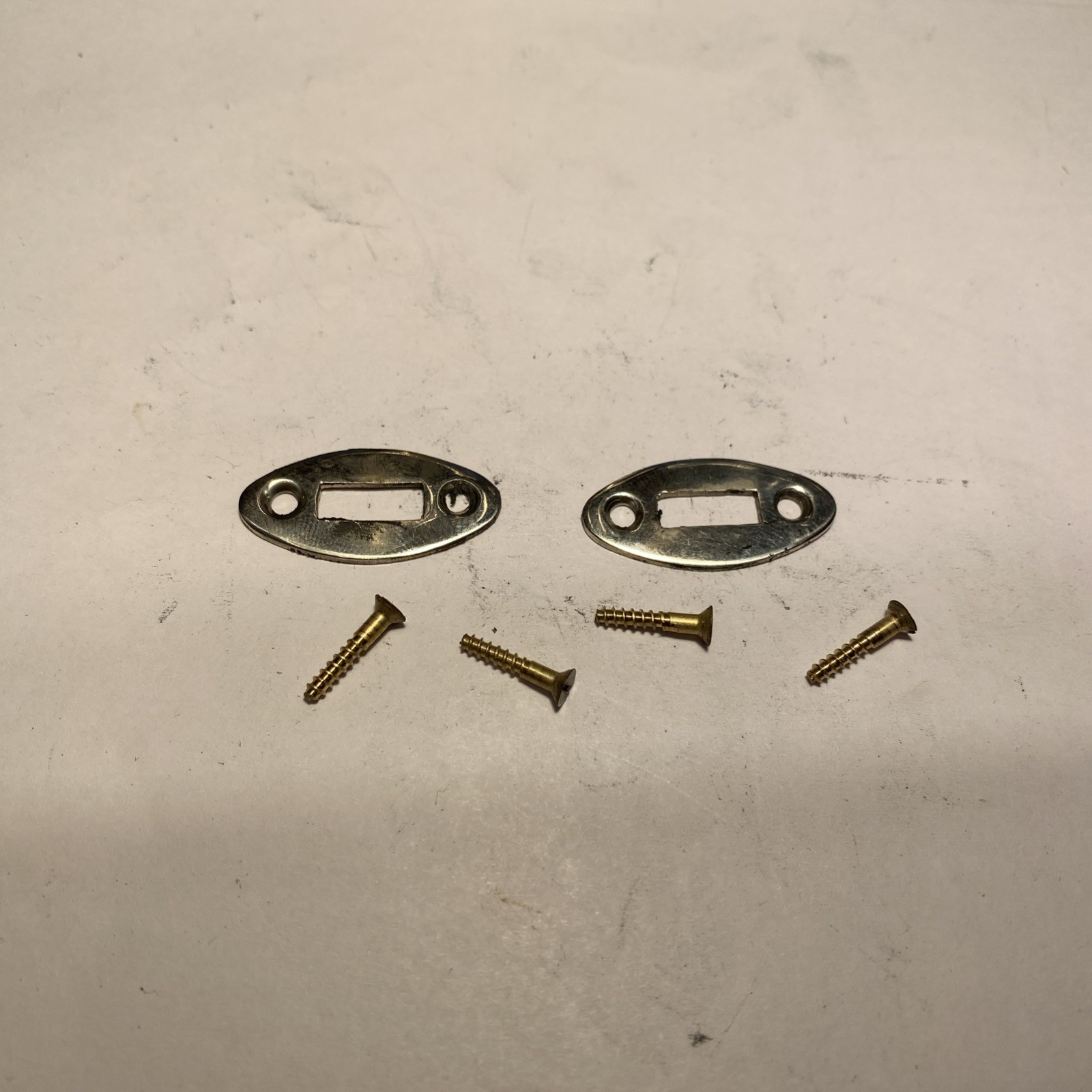 Steel Wedge Plates From a Mountain Muzzleloader Rifle And 4 Steel Screws